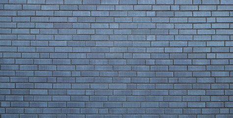 Fototapeta na wymiar Moderne Fassade aus Klinkersteinen in grau