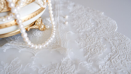 Pearls on lace bridal accessories - obrazy, fototapety, plakaty
