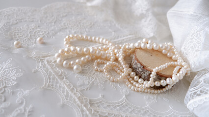 Pearls on lace wedding background