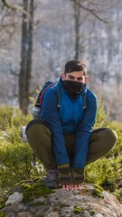 man sitting on a tree