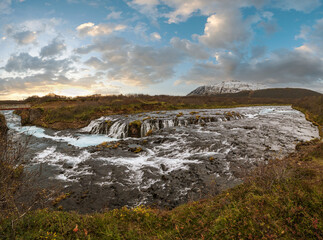 Picturesque waterfall Bruarfoss autumn view. Season changing in southern Highlands of Iceland.