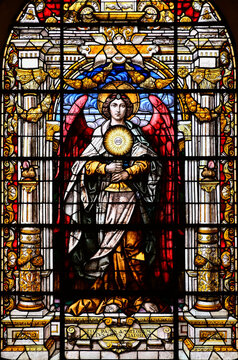 Angel with Eucharist stain glass