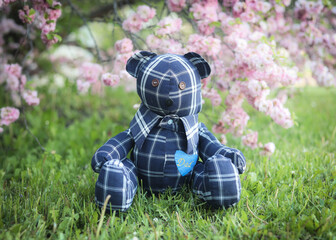 Remembrance teddy bear made from a shirt honouring the life of a father.