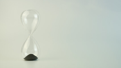 Hourglass on a white background. copy space.