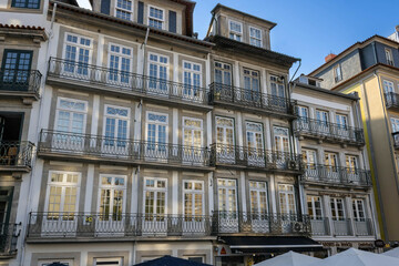Fototapeta na wymiar A renivated historical building on Rua das Flores, Porto