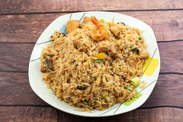 Special chaufa with chicken, beef, shrimp and pork.