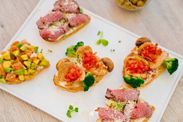 sandwiches with meat and vegetables. catering for the holiday. buffet menu.