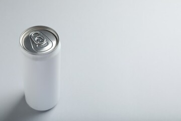 Can of energy drink on white background. Space for text