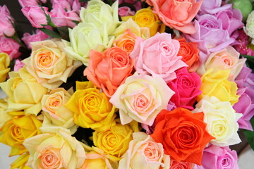 Obraz na płótnie Canvas Artificial rose flowers mixed bouquet