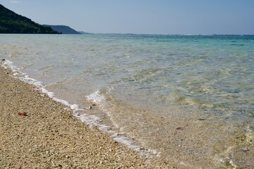 Waves are clear and calm on the beach
