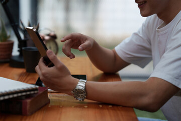 Man Completes KYC using an online banking app in order to open a digital savings account. The definition of cyber security