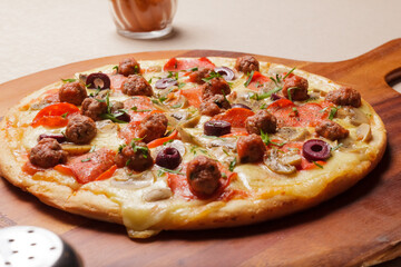 Delicious pizza served on wooden plate  - Imagen