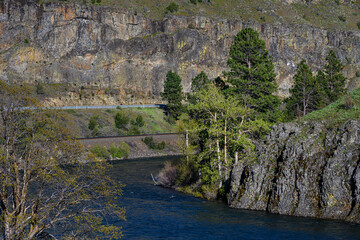 Scenic view of the Yakima River with train tracks running alongside, sunny spring day in Kittitas County, Eastern Washington State
