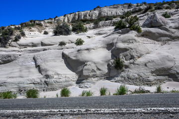 Erosion on sandstone cliffs on a sunny day in Kittitas County, as a nature background
