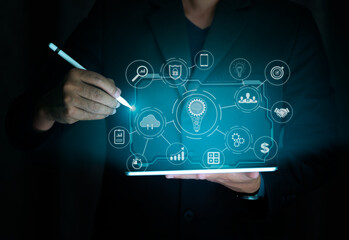 Businessman holding tablet show digital screen, digital layer effect, business strategy analytic...