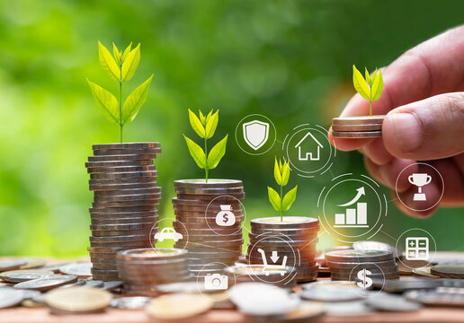 Hand putting coin with plant on coin stack growing with business icon over green bokeh background, Strategy concept.tree growing on the coin, Business Finance, Earning, benefits, Capital,  Save Money