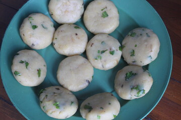 Perkedel is a typical Indonesian food made from fried potatoes then mashed, mixed with scallions and spices, shaped flattened, dipped in beaten egg and then fried