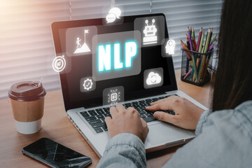 NLP natural language processing cognitive computing technology concept, Business person hand typing keyboard with VR screen NLP icon, AI Artificial intelligence.