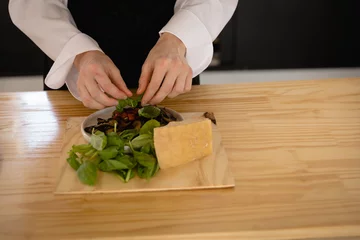 Gordijnen Chef preparing a salad © wavebreak3