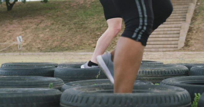 Female friends enjoying exercising at boot camp together