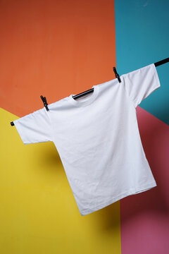 White t-shirt mockup over colorful background