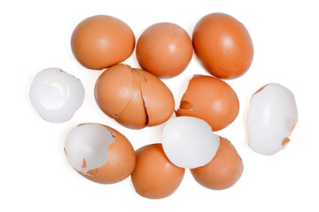 Top view group of broken eggshells stacked on white background