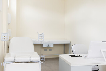 Gynecological room with chair and equipment in modern clinic