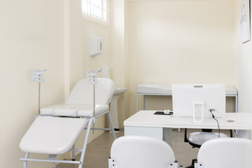 Gynecological room with chair and equipment in a clinic.