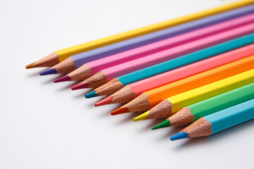 Set of colored pencils, school equipment on the table
