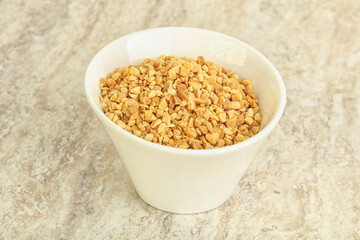 Crunched roasted peanut in the bowl