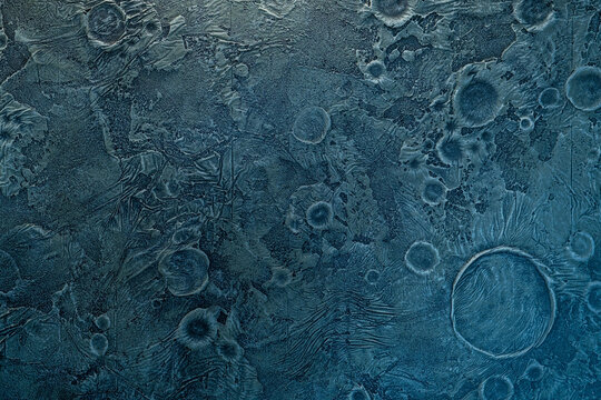 Blue background of the lunar surface. Imitation of lunar craters, texture