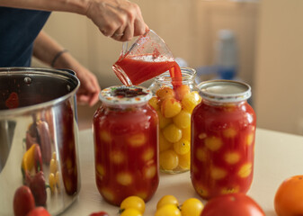 Home canning of vegetables. Canning yellow tomatoes in tomato juice