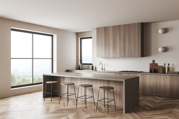 Light kitchen interior with island and seats, kitchenware and window