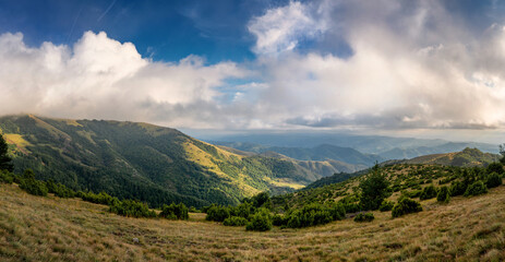 Summer landscape with green hills and blue sky with clouds. Mountain resort in Serbia Kopaonik. Panorama shot