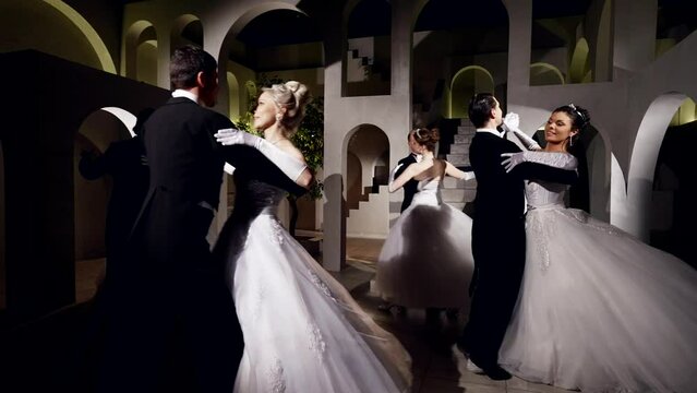 ball in graduation party, couples are dancing waltz and whirling by music, romantic historical student ball