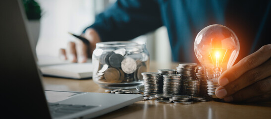 Man hands putting coins stack, Concept business finance saving money and investment.