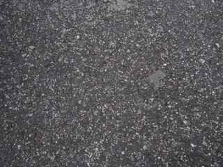 細かい目の黒色のコンクリートのテクスチャー