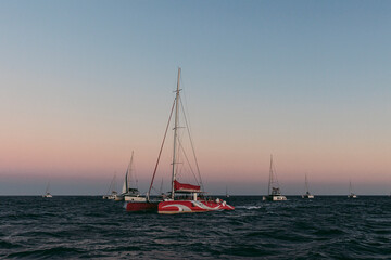 boat, sea, sunset, yacht, water, sailboat, sail, sky, sailing, ocean, boats, ship, sun, harbor, travel, summer, clouds, horizon, marina, mast, port, sunrise, coast, evening, bay, greece, santorini, is