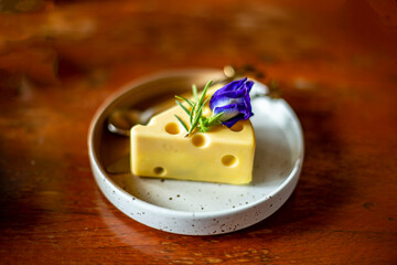 Close up photo of Cake shaped like cheese cube