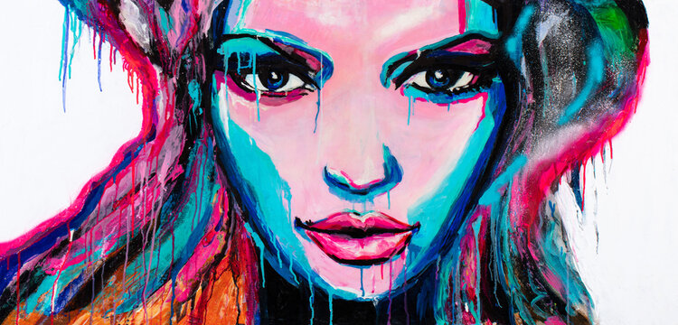 Contrast painting background, beautiful girl face. Acrylic portrait painting in multicolored tones. Abstract picture of a beautiful girl. Conceptual closeup of painting and palette knife on canvas.