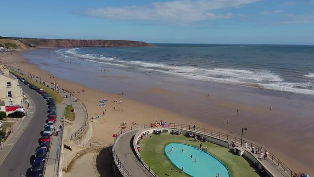 Drone. Filey beach sea front on the east coast of England. Holiday, summer vacation, people.  East Yorkshire. 