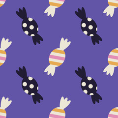 Seamless vector pattern with candies on blue background. Modern design for fabric and paper, surface textures.
