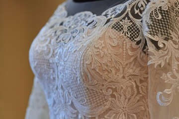 Lace and embroidery on fabric with beads wedding dresses