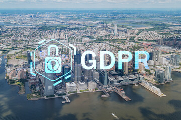 Aerial panoramic helicopter city view of New Jersey City financial Downtown skyscrapers. GDPR hologram, concept of data protection regulation and privacy for all individuals