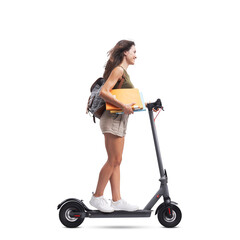 Student riding an electric scooter