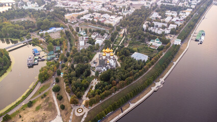 Drone aerial view of the historical center of Yaroslavl, Russia, with the Cathedral of the Assumption and the boulevard at sunset. travel background