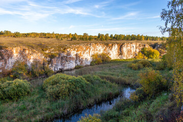 Fototapeta na wymiar Ustinovsky limestones. It is located in the valley of the Miass river near Ustinovo village. South Ural, Chelyabinsk region, Russia.