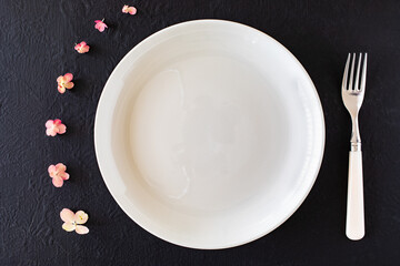 Empty plate on wooden table
