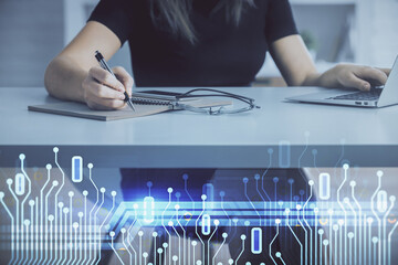 Multi exposure of woman hands working on computer and data theme hologram drawing. Tech concept.