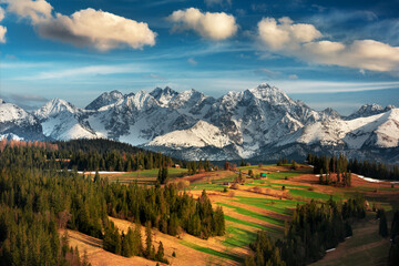 View of the Tatra Mountains, meadows, pastures, from Gliczarów Górny. Spring, Poland. Widok na...
